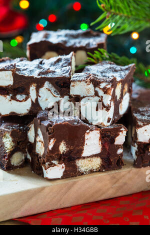 Rocky road crunch bars, christmas dessert made with chocolate,  marshmallow, hazelnut, biscuit and glace cherries Stock Photo