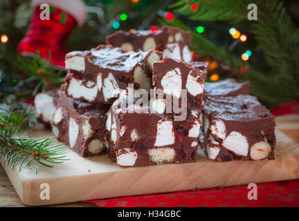 Rocky road crunch bars, christmas dessert made with chocolate,  marshmallow, hazelnut, biscuit and glace cherries Stock Photo