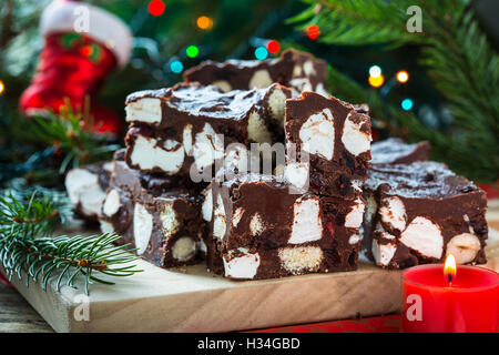 Rocky road crunch bars, christmas dessert made with chocolate,  marshmallow, hazelnut, biscuit and glace cherries Stock Photo