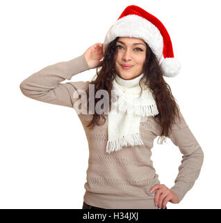 girl in santa hat portrait, posing on white background, christmas holiday concept, happy and emotions Stock Photo