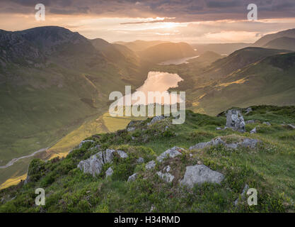 Sunset from the summit of Fleetwith Pike looking over Buttermere in the English lake District national park, England, UK Stock Photo