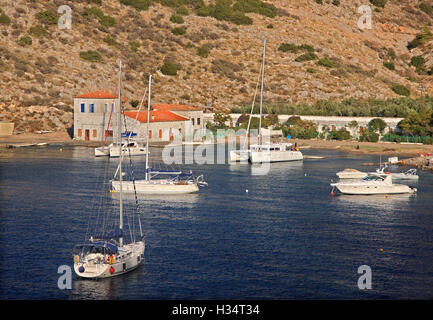 Yachts anchored at Mandraki beach, Hydra island, Attica, Greece. Stock Photo