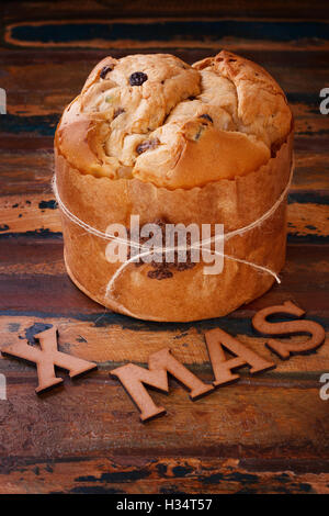 Panettone - sweet bread loaf traditional for Christmas and New Year. Selective focus Stock Photo