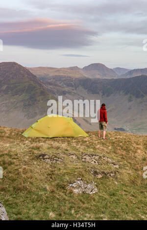 Wild camper on High Snockrigg above Buttermere in the English Lake District national park Stock Photo