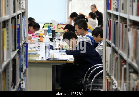 Harbin. 4th Oct, 2016. People read at the Heilongjiang Provincial ...