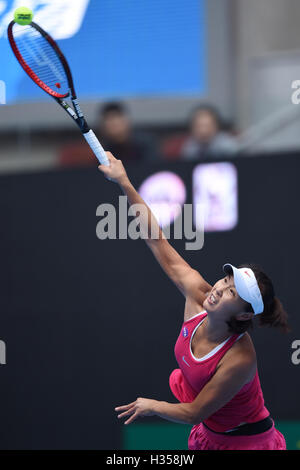 Beijing, China. 5th Oct, 2016. Peng Shuai of China serves to Caroline Garcia of France during their women's singles second round match at the China Open tennis tournament in Beijing, capital of China, Oct. 5, 2016. Peng lost the match 1-2. Credit:  Ju Huanzong/Xinhua/Alamy Live News Stock Photo