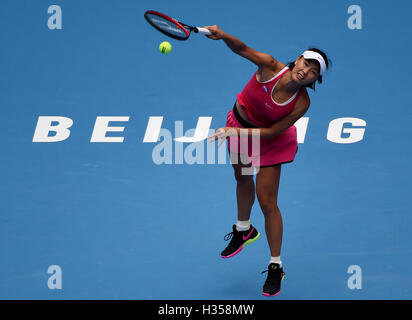 Beijing, China. 5th Oct, 2016. Peng Shuai of China serves to Caroline Garcia of France during their women's singles second round match at the China Open tennis tournament in Beijing, capital of China, Oct. 5, 2016. Peng lost the match 1-2. Credit:  Zhang Chenlin/Xinhua/Alamy Live News Stock Photo