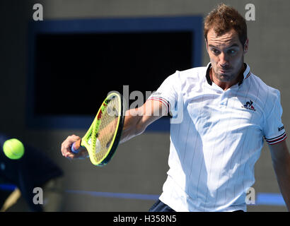 Beijing, China. 5th Oct, 2016. Richard Gasquet of France hits a return to Sam Querrey of the United States during the men's singles first round match at the China Open tennis tournament in Beijing, capital of China, Oct. 5, 2016. Gasquet won 2-1. Credit:  Zhang Chenlin/Xinhua/Alamy Live News Stock Photo