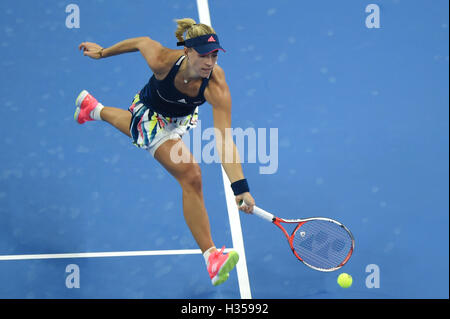 Beijing, China. 5th Oct, 2016. Angelique Kerber of Germany hits a return to Barbora Strycova of the Czech Republic during their women's singles second round match at the China Open tennis tournament in Beijing, capital of China, Oct. 5, 2016. Kerber won 2-0. Credit:  Ju Huanzong/Xinhua/Alamy Live News Stock Photo