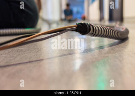 electrical coil conduit pipe on box embedded in wall Stock Photo - Alamy