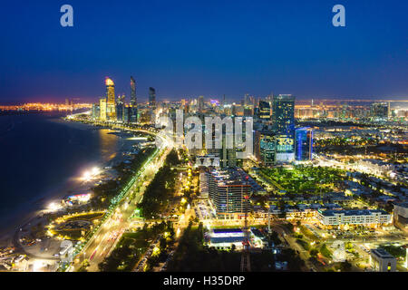 Skyline and Corniche, Al Markaziyah district by night, Abu Dhabi, United Arab Emirates, Middle East Stock Photo