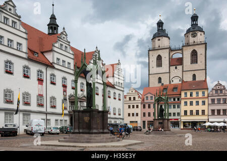Town Square with Stadtkirke and Town Hall, Staue of Martin Luther, Lutherstadt Wittenberg, Saxony-Anhalt, Germany Stock Photo