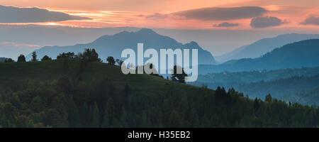 Carpathian Mountains landscape at sunrise near Bran Castle, Transylvania, Romania Stock Photo