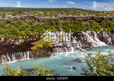 Hraunfossar, a series of waterfalls pouring into the Hvita River, Borgarfjordur, western Iceland, Polar Regions Stock Photo