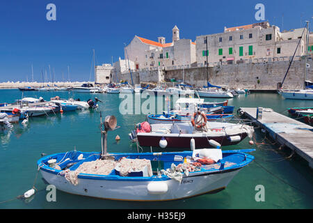 Fishing boats at the harbour, old town with cathedral, Giovinazzo, Bari district, Puglia, Italy Stock Photo