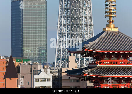 A telephoto view shows the Goju-no-to five-storied Pagoda at Senso-ji Temple in Asakusa and Tokyo Skytree (the world's tallest Stock Photo