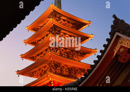 A telephoto view shows the Goju-no-to five-storied Pagoda at Senso-ji Temple in Asakusa and Tokyo Skytree (the world's tallest Stock Photo