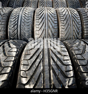 Used old car tires or junk detail pattern, background or texture Stock Photo