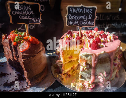 Gluten free and vegan chocolate and fruit layer cakes. Stock Photo