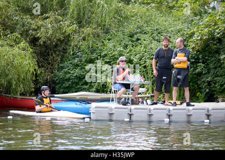 The scorers table at a canoe water polo match on the River Ouse in Bedford, Bedfordshire, England Stock Photo