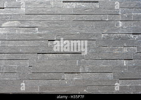 Background from a grey granite tiled wall Stock Photo