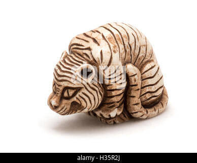 Small Japanese accessory of a seated tiger Stock Photo