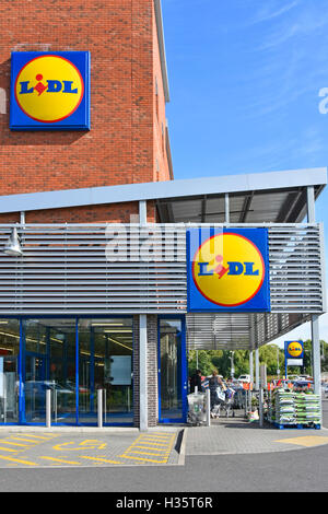 Exterior Lidl UK supermarket store on corner site with three logo panels Tamworth town in Staffordshire England Stock Photo