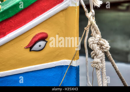 Bow of traditional Maltese fishing boat called Luzzu, with the Eye of Horus or Osiris Stock Photo