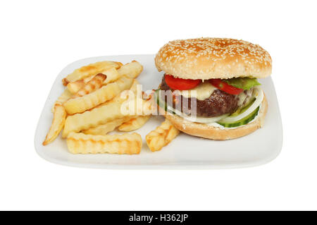 Cheeseburger and chips on a plate isolated against white Stock Photo