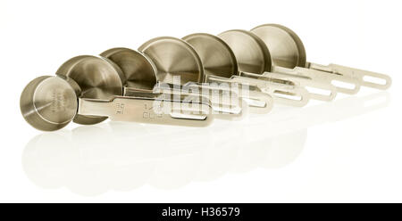 Stainless steel measuring cups on an isolated background Stock Photo