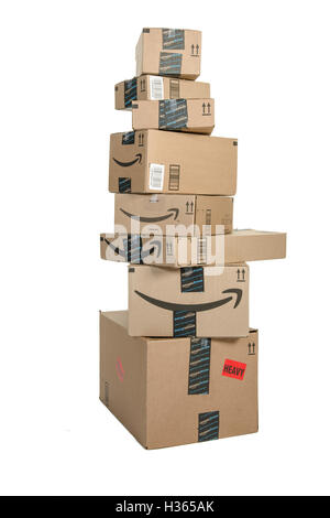 Winneconne, WI - 21 September 2016:  Bunch of Amazon boxes stacked on an isolated background. Stock Photo