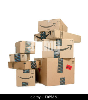 Winneconne, WI - 21 September 2016:  Bunch of Amazon boxes stacked on an isolated background. Stock Photo