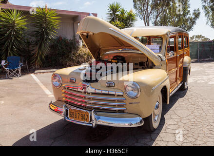 Laguna Beach, CA, USA - October 2, 2016: Tan and wood 1946 Ford Woody owned by George Nelson and displayed at the Rotary Club of Stock Photo