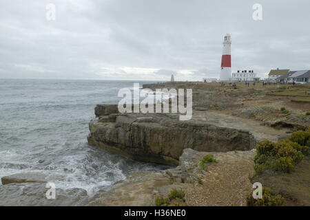 The red and white lighthouse at Portland Bill on the isle of Portland. Stock Photo