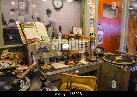 A 'frozen in time look' inside Sam Phillips vintage recording booth full of equipment & turntables & photos at Sun Records Studio in Memphis,  TN Stock Photo