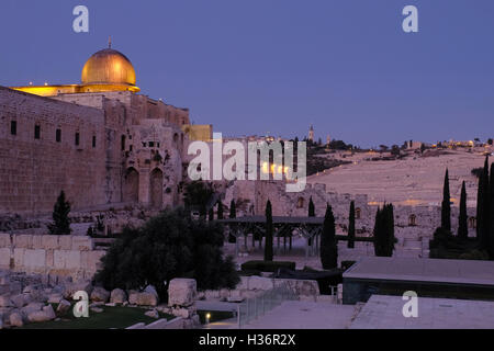 View at twilight of Al-Aksa Mosque along the southern wall of Haram al Sharif with mount of Olives in background in East Jerusalem Israel Stock Photo