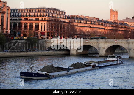 Sunset on River Seine with Pont Neuf and cityscape of Right Bank in the background. Paris. France Stock Photo