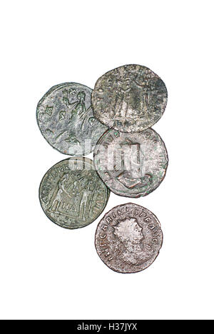 Many ancient bronze coins on white Stock Photo