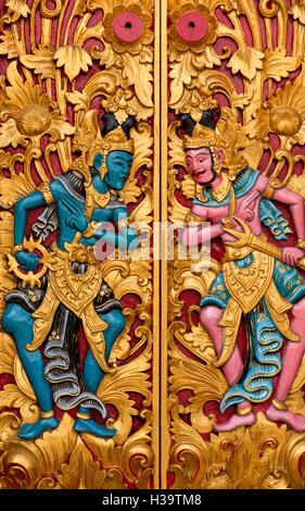 K1978Indonesia, Bali, Candikuning, Puru Ulun Danu Bratan temple, ornatiely carved, gilded, painted wooden temple door Stock Photo