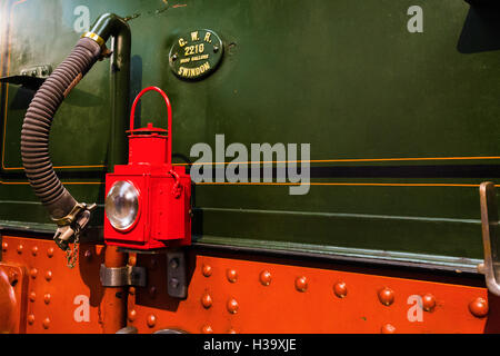 Rear light and brass builders plate on water and coal tender of City of Truro GWR 3700 Class 3440 steam engine Stock Photo