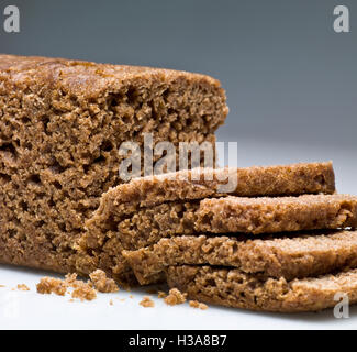 Icelandic Rugbraud. Traditionally baked in wooden casts and buried near hot springs. Compared to rye and pumpernickel bread. Stock Photo