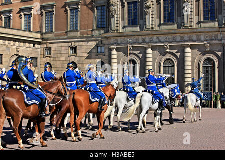 The horse- mounted Swedish Royal band performing at the Royal Palace (Kungliga Slottet), Gamla Stan, Stockholm, Sweden. Stock Photo