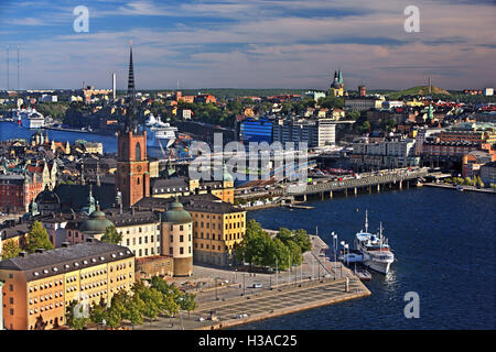 The bridges that connect Gamla Stan and Riddarholmen with Sodermalm, Stockholm, Sweden. View from the City hall tower. Stock Photo