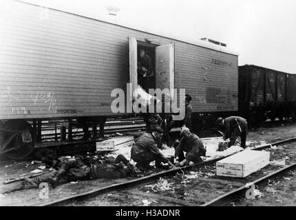 German soldiers unload a conquered Soviet train on the Eastern Front, 1941 Stock Photo