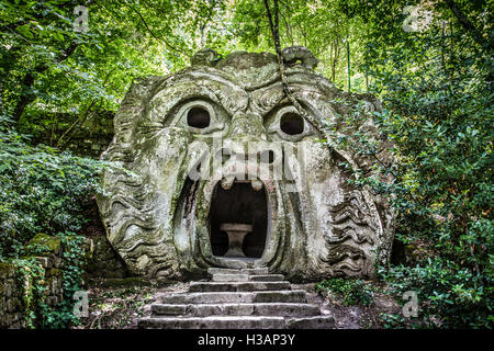 Orcus mouth sculpture at famous Parco dei Mostri (Park of the Monsters), also named Sacro Bosco (Sacred Grove) or Gardens of Bomarzo, Viterbo, Italy Stock Photo