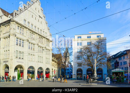 ZURICH, SWITZERLAND - DECEMBER 27, 2015: Scene of the Paradeplatz (Parade) square, with locals and visitors, in Zurich, Switzerl Stock Photo