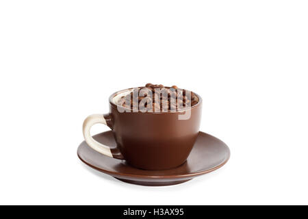 Cup full of roasted coffee beans isolated over white background Stock Photo