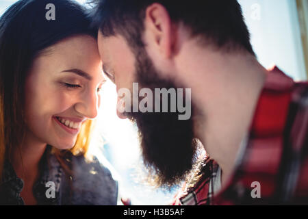 Close-u of happy couple looking at each other in cafe Stock Photo