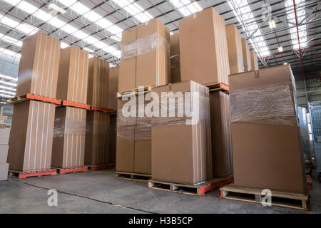 Cardboard boxes in warehouse Stock Photo