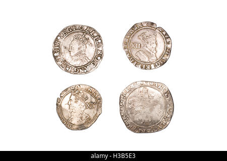 Many ancient silver coins on white Stock Photo